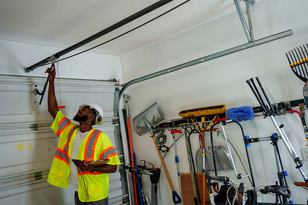 Professional Garage Door Panel Replacement technician working in Elkader, IA